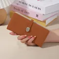 Stylish long brown PU leather women's wallet with buckle closure and card slots - Brown