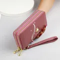 Elegant mauve women's double zipper long wallet with pearl crown detail and wrist strap - Dusty Pink