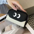 Portamonete carino con occhi da cartone animato in pelle martellata nera e crema - Nero