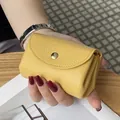 Handmade genuine leather mini coin purse in vibrant yellow pebbled finish with gold snap - Yellow