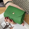 Premium green genuine leather mini coin purse with gold snap closure detail - Mangosteen Green