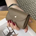 Premium compact olive brown pebble grain leather coin purse with gold snap button closure - Khaki