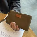 Elegant brown genuine leather small clutch bag with zipper closure and wrist strap - Khaki