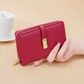 Vintage burgundy PU leather medium wallet for women with an elegant gold buckle closure. - Burgundy