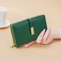 Elegant retro dark green PU leather women's wallet featuring a gold buckle and zipper - Green