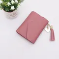 Elegant dusty rose short folding wallet featuring heart charm and decorative tassel - Tassel Style / Deep Pink