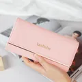 Elegant pink faux leather long wallet for women with gold metal bar and embossed lettering - Pink
