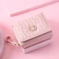 Pink short quilted wallet for women featuring elegant wheat V logo and wavy stitching - Pink