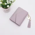 Elegant dusty purple short bifold wallet for women with heart charm and tassel detail - Tassel Style / Light Purple