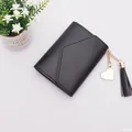 Elegant black short wallet for women featuring a golden heart charm and stylish tassel - Tassel Style / Black