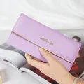 Elegant purple tri-fold long wallet for women featuring cross-grain leather and gold bar - Violet