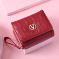 Elegant red short folded wallet featuring a wavy quilted pattern and a gold V logo. - Wine Red
