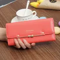 Long red women's wallet featuring a cute bow and floral metal accents - Watermelon red