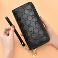 Elegant women's black long wallet with embossed star pattern and secure double zipper closure - Four-pointed Star Embossed Double Zip (FC Four-pointed Star Double Zip) / Black Patent Leather