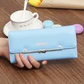 Elegant light blue long wallet for women with bow buckle and flower rivets - Blue