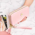 Elegant pink long wallet featuring a cute daisy pattern and double zipper closure for women - Pink