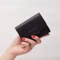 Compact black tri-fold wallet for women with minimalist rectangular metal buckle design - Cube Style / Black