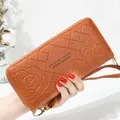 Elegant long brown leather wallet for women featuring rose embossing and a wrist strap - Long Style (FC181207) / Brown