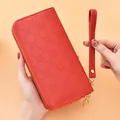 Grand portefeuille rouge embossé pour femme avec double fermeture éclair et dragonne - Gaufrage Étoile à Quatre Branches Double Zip (FC Étoile à Quatre Branches Double Zip) / Rouge Mat