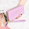 Stylish lavender women's long wallet featuring a daisy motif and double zipper closure - Purple