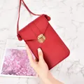 Elegant red vertical mobile phone bag with golden lock and thin adjustable shoulder strap - Red