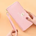 Stylish pink long wallet for women featuring a wrist strap and cute bear design - Pink Cartoon Bear Style / Pink