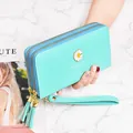 Mint green women's long wallet with daisy motif and double zipper closure - Green