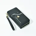 Elegant black double zipper long wallet for women with pearl accent and wrist strap - Black