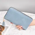 Elegant blue woven texture long zip-around wallet with stylish matching tassel detail - Sky Blue