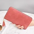 Stylish long woven texture clutch wallet for women with zipper and pink tassel - Dusty Pink