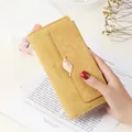 Vintage yellow PU leather long wallet for women with elegant leaf buckle design. - Yellow