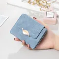 Elegant light blue frosted leather women's short wallet with gold leaf metal clasp - Blue