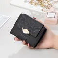 Minimalist black matte short wallet with gold leaf charm and embossed pattern - Black
