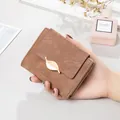 Elegant vintage brown frosted wallet with gold leaf clasp and leaf pattern detail - Brown