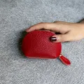 Mini red pebbled leather dumpling coin purse with gold zipper for women - Burgundy