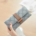 Elegant light blue long tri-fold wallet for women with stylish embossed floral pattern - Fog Blue