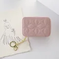 Elegante astuccio per rossetto rosa compatto con trapuntatura a rombi e catena - Rosa