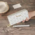 Elegant white geometric printed long wallet for women with double zippers and wristlet strap - White