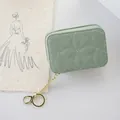 Small sage green mini cosmetic bag with diamond quilted stitching and gold keychain - Green