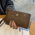 Elegant brown cowhide leather clutch wallet with embossed camellia floral patterns - Gray