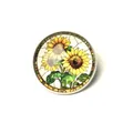 Detailed view of vintage glass cabochon brooch with vibrant sunflower garden pattern - Sunflower