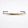 Close-up of 4mm rose gold stainless steel cuff bracelet with Beach Soul engraving - Beach Soul Quote / Rose Gold