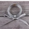 Set of five silver glitter filled silicone bangles tied with an elegant grey ribbon bow - 5 Pieces / Silver