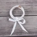 Multilayer white glitter silicone bracelets with a decorative white satin ribbon bow. - White