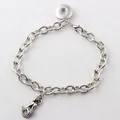 Silver-toned chain bracelet featuring a mermaid charm and a Noosa style snap button base - Mermaid Tail Pendant / Brown