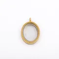 Detailed macro view of an oval gold floating locket featuring a beaded border design. - Gold