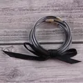 Set of multi-layer clear silicone glitter bangles featuring a decorative black ribbon bow - 5 Pieces / Black