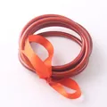 Set di tre vivaci braccialetti jelly arancioni con design a tubo in silicone metallico - Oro Arancio