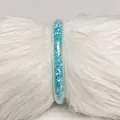 Brazalete de silicona PVC transparente de 9mm con relleno de circonitas azules - Azul cielo