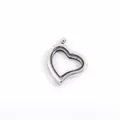 Detailed view of a silver heart-shaped floating locket pendant with glass frame - White K/Silver